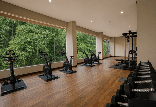 Resort grounds and pool where guests keep up their workouts