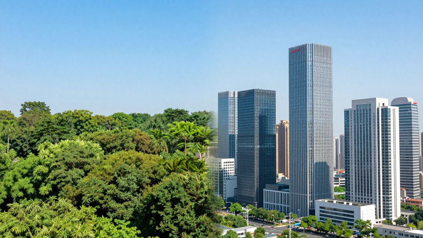 Green forest merging with a modern city skyline.