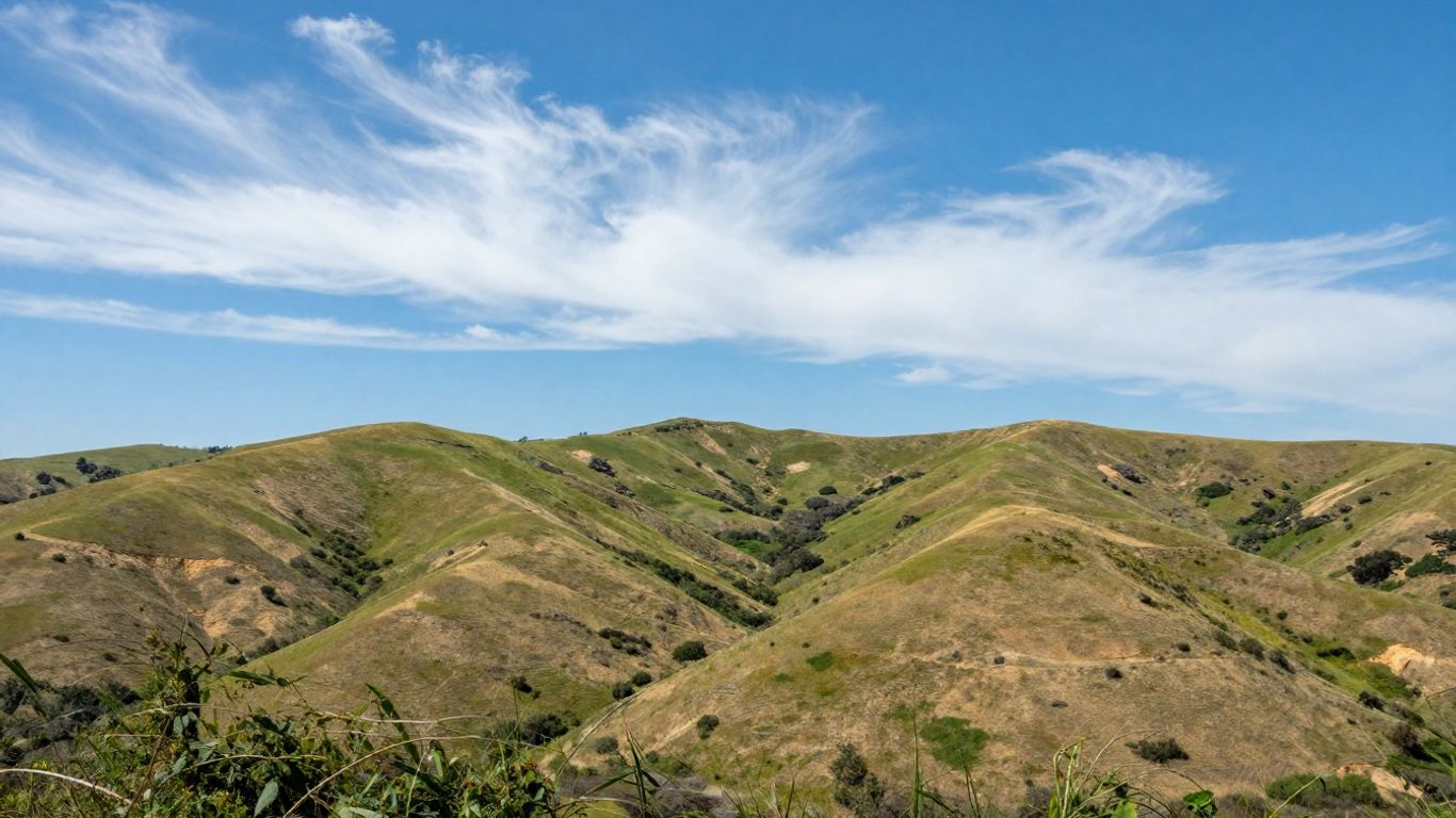 California landscape with rolling hills and blue sky.
