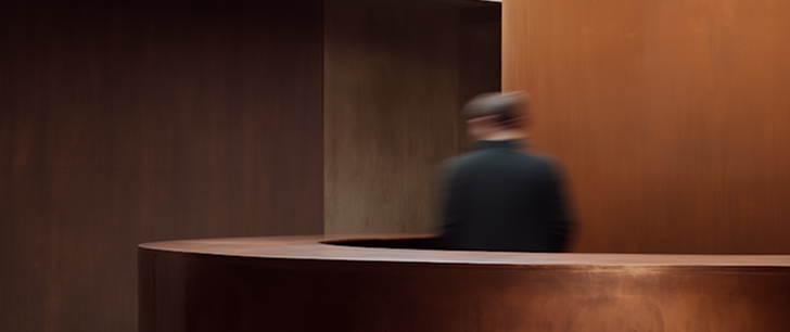 Consultant discussing strategy in a dark office setting