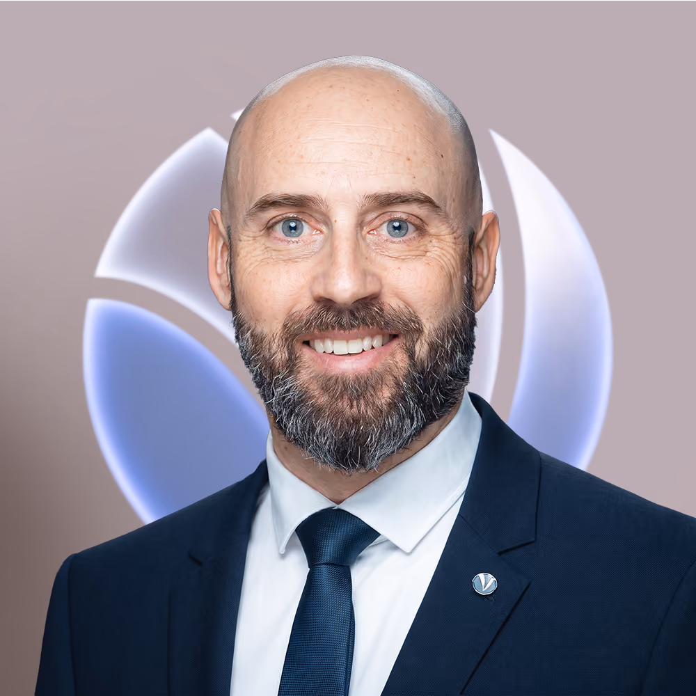 Professional headshot of Mr. Jean-Pierre Legras