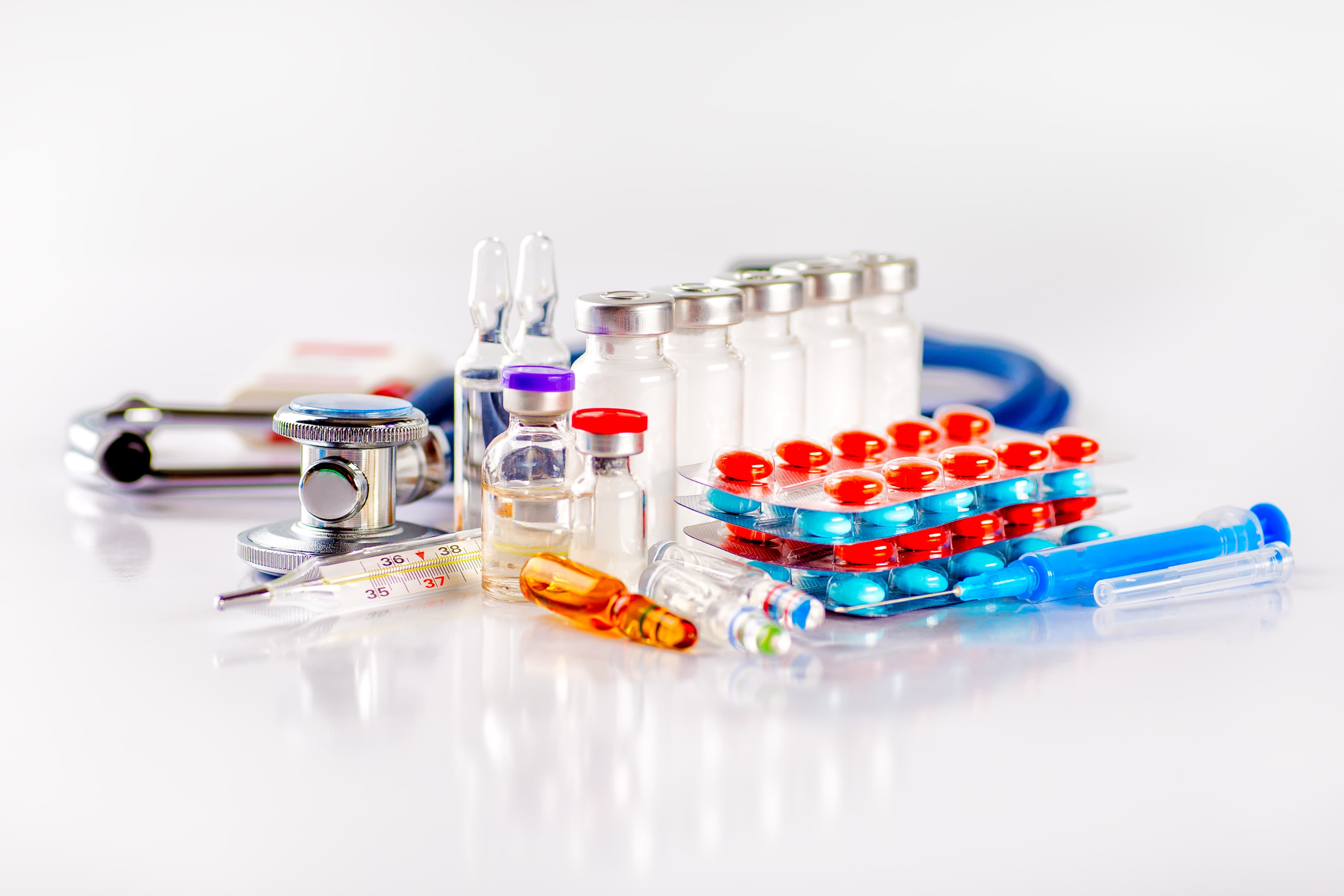 Optometrist discussing medication-related eye monitoring with a patient