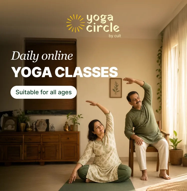 Two adults practicing yoga at home