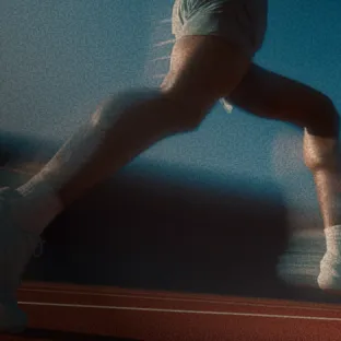 an image of athlete running, motion blur