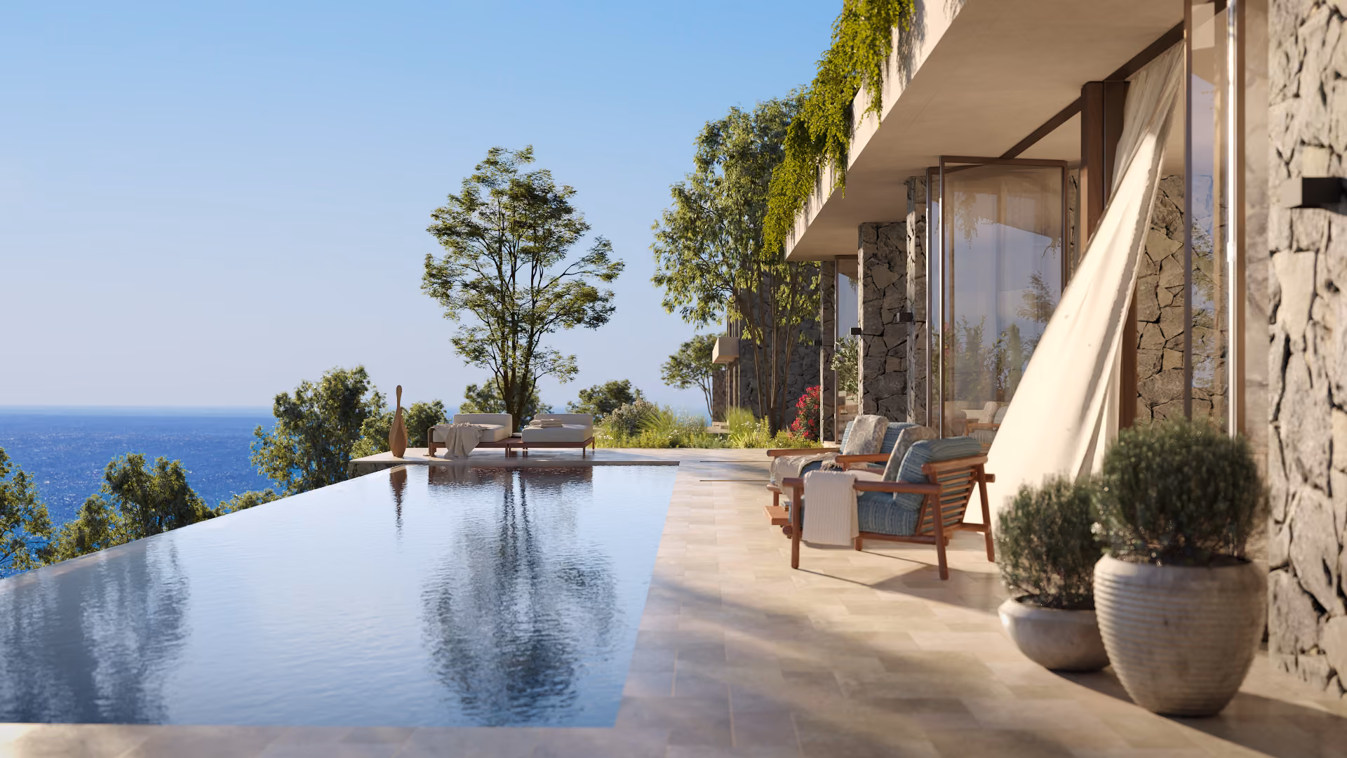 Infinity pool and shaded terrace of a modern villa overlooking the Adriatic