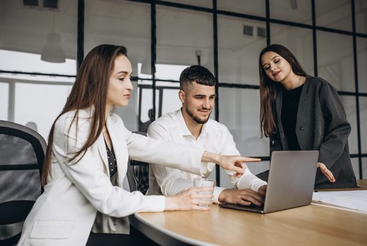 ABN members working together at a laptop