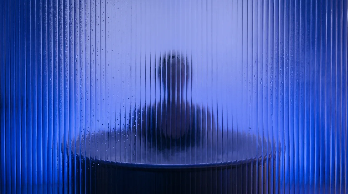 Person in a cold plunge at Plunged, recovery studio in Gent