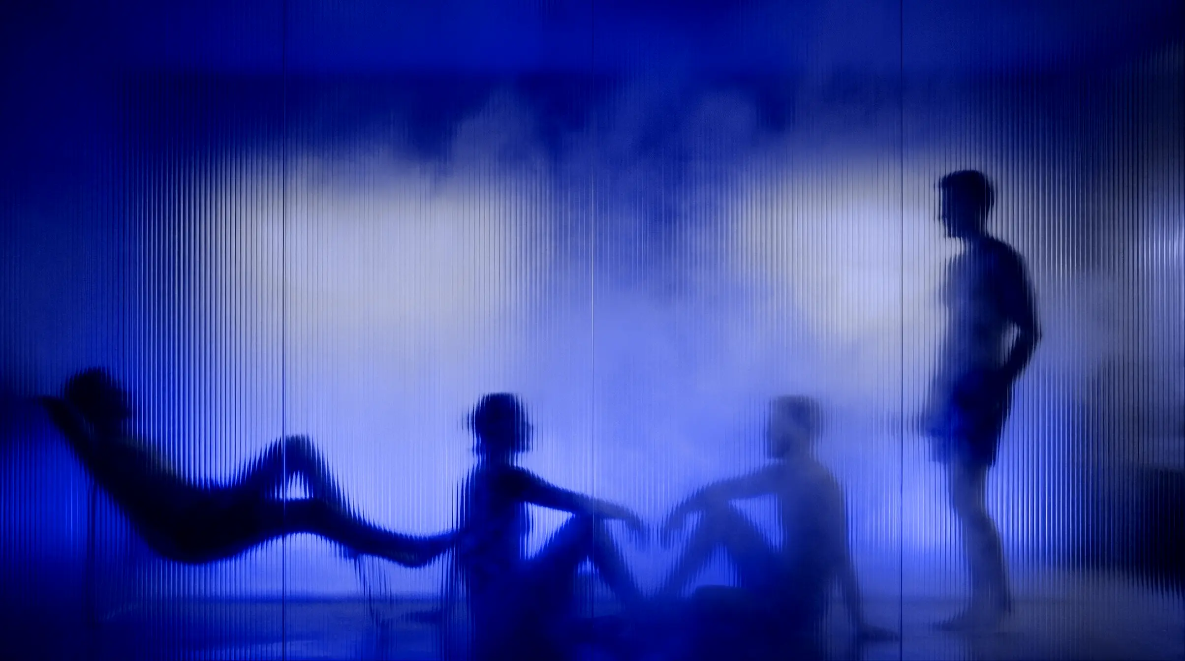 Silhouettes together in the sauna at Plunged, urban recovery studio in Ghent