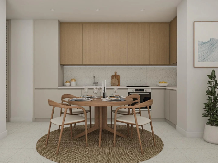 Kitchen and dining area with wood cabinetry and a round table