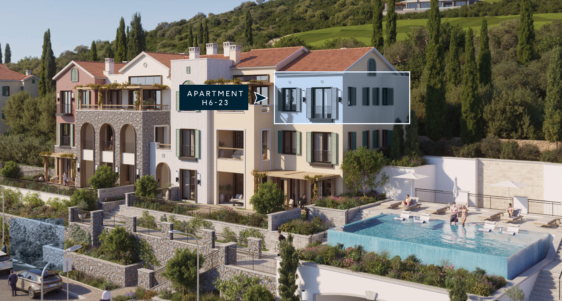 Stone and white apartment buildings with a pool and landscaped hillside