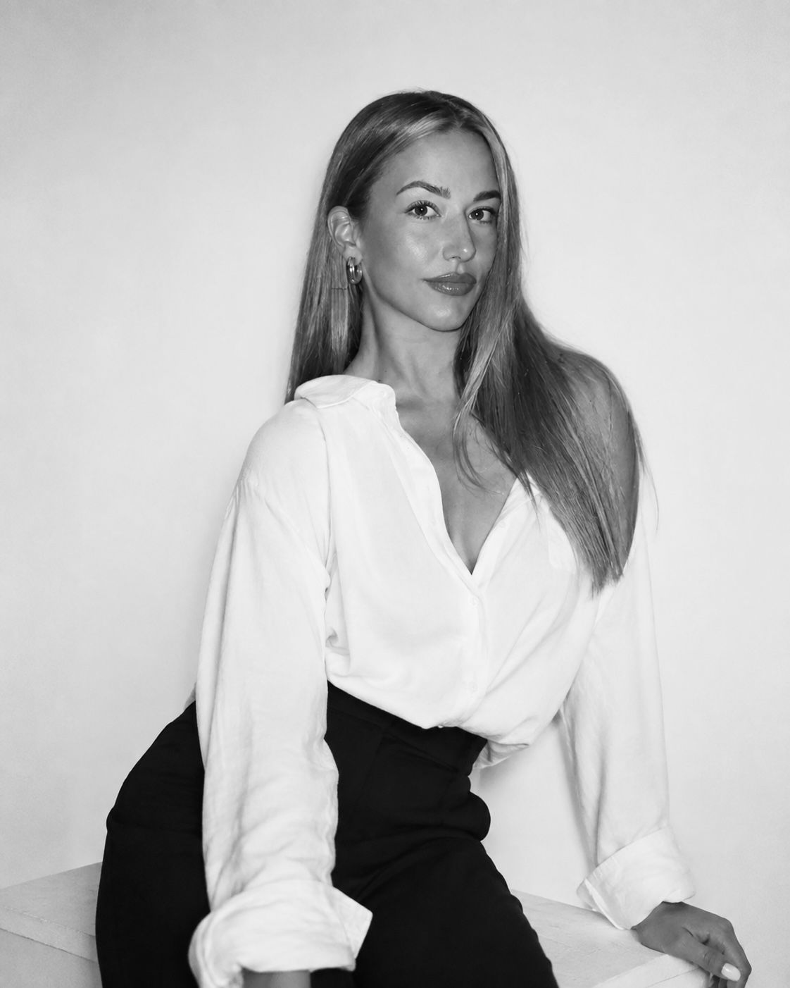 Black-and-white portrait of Tina Miranovic, partner at Adria Estates