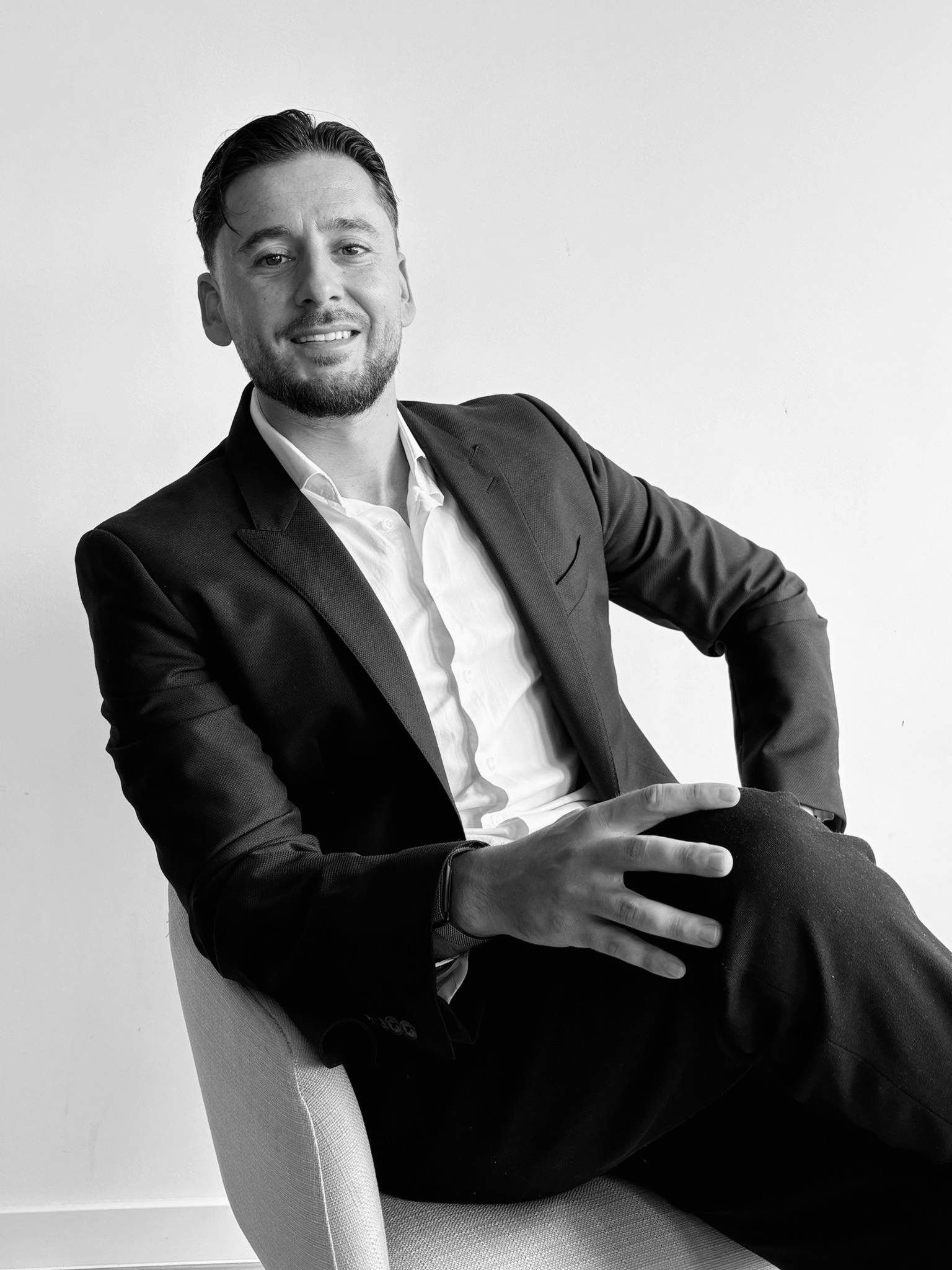 Black-and-white portrait of Andrej Grulovic, founder of Adria Estates