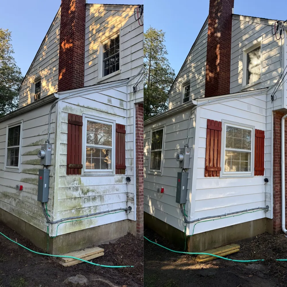 Side of a home before and after washing, green algae gone from the siding and foundation