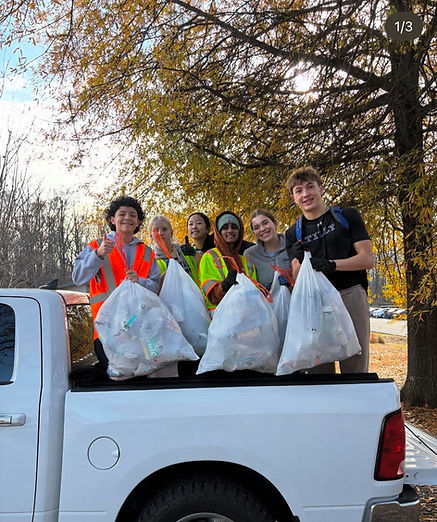 Youth volunteers at a Mission Green Global trash clean-up event.