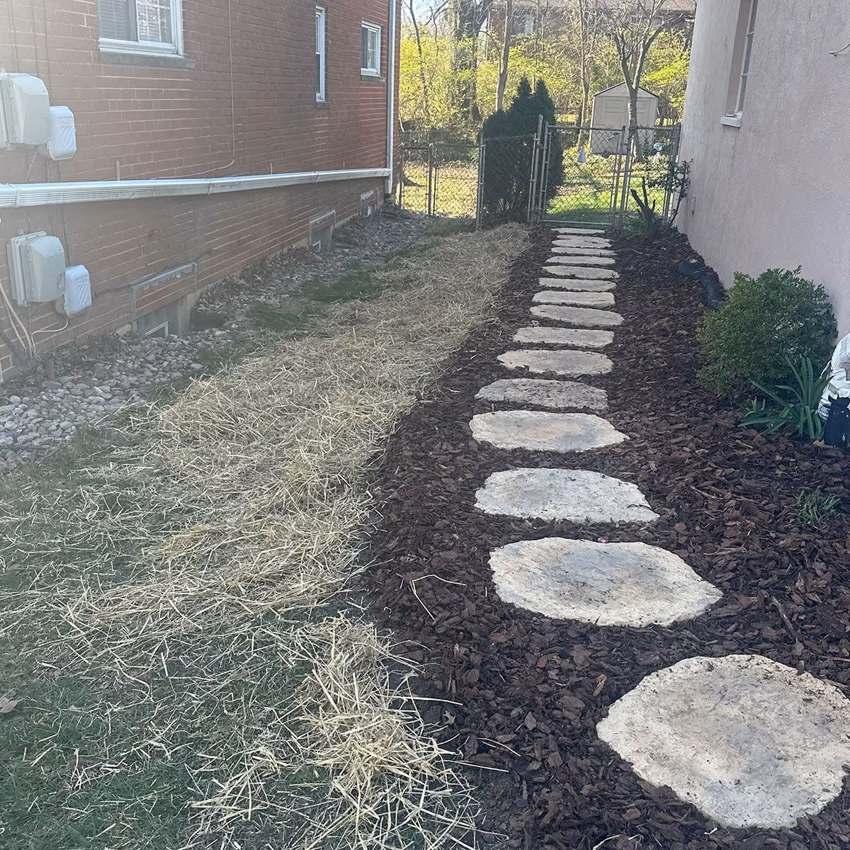 Triscapes custom paver installation near me featuring a professionally designed patio and walkway for a polished outdoor space.
