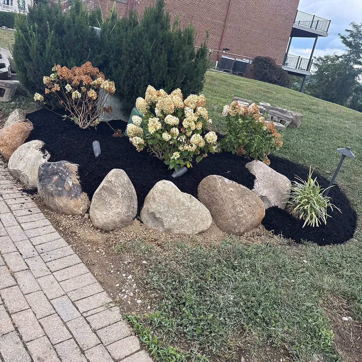 Triscapes professional landscaping near me featuring custom plantings, fresh mulch, and beautifully maintained outdoor spaces.