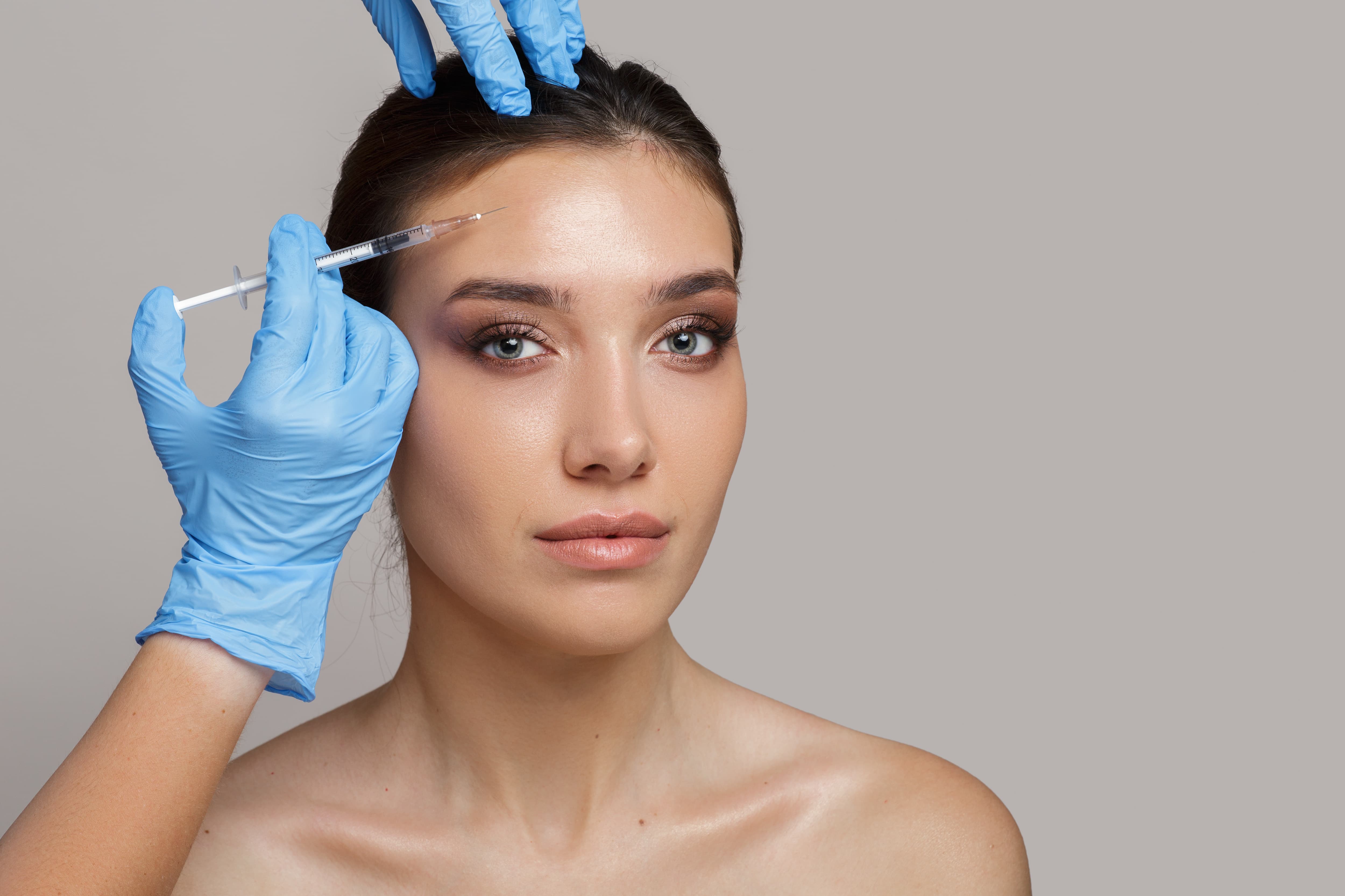 Facial assessment before neurotoxin treatment illustrating a full-face tox approach