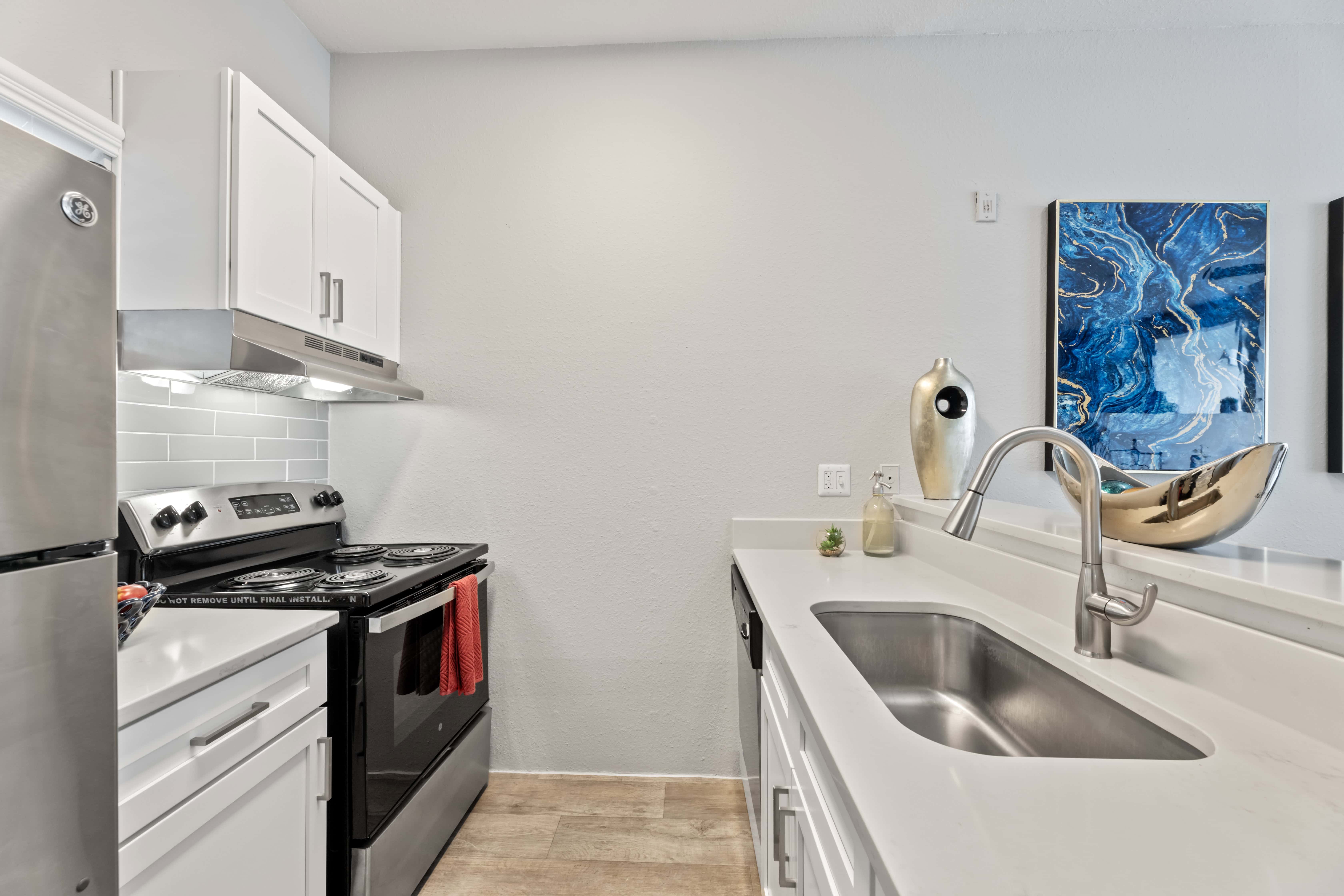 Kitchen with white cabinets