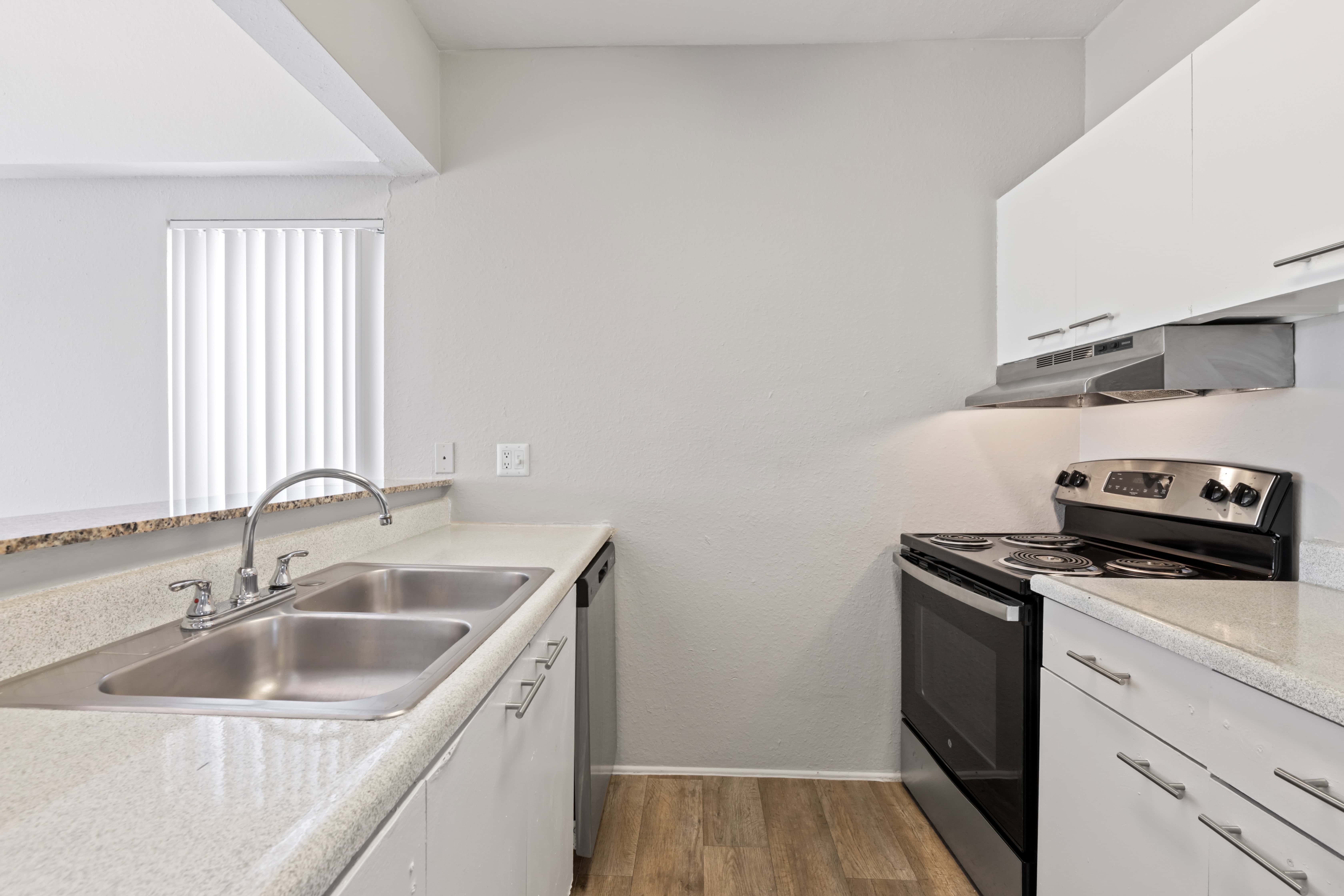 Kitchen with white cabinets