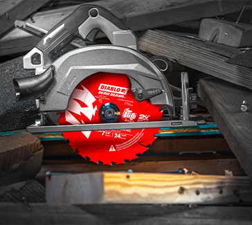 Diablo circular saw blade cutting through wood, representing brand development, packaging design, and marketing systems for the power tool brand.