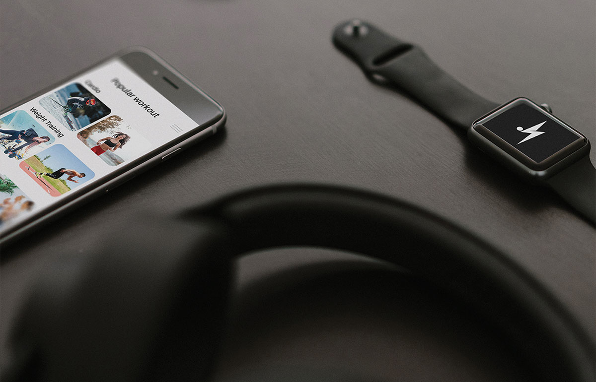 Smart fitness app concept featuring the Over The Wall Fitness identity.