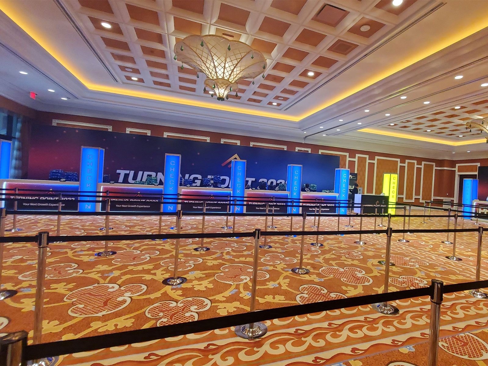 Branded registration area for Turning Point 2022 featuring environmental graphics, signage, and attendee check-in stations.