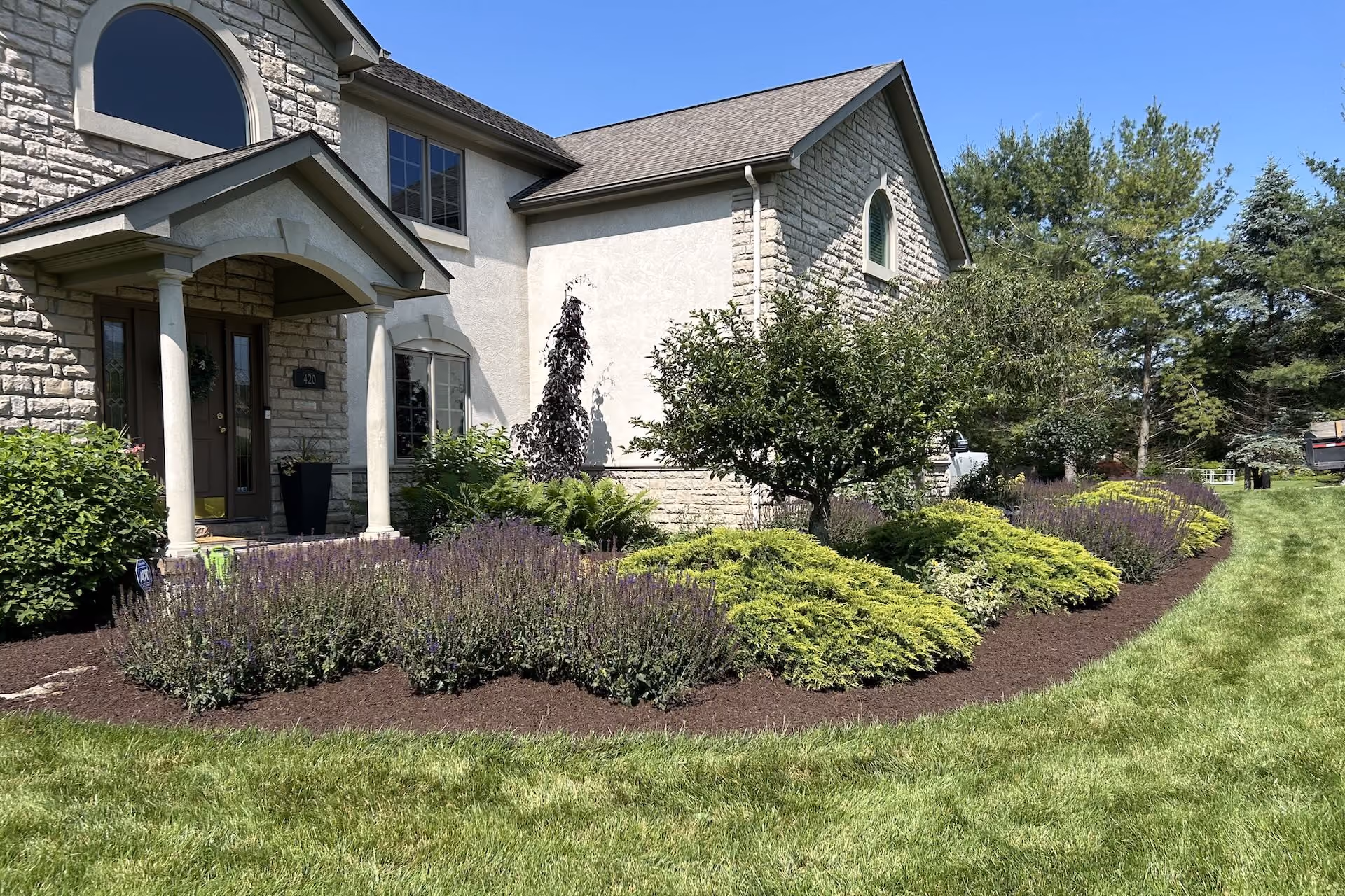 Custom residential landscaping by Howie’s Lawn Care LLC in Hilliard, Ohio