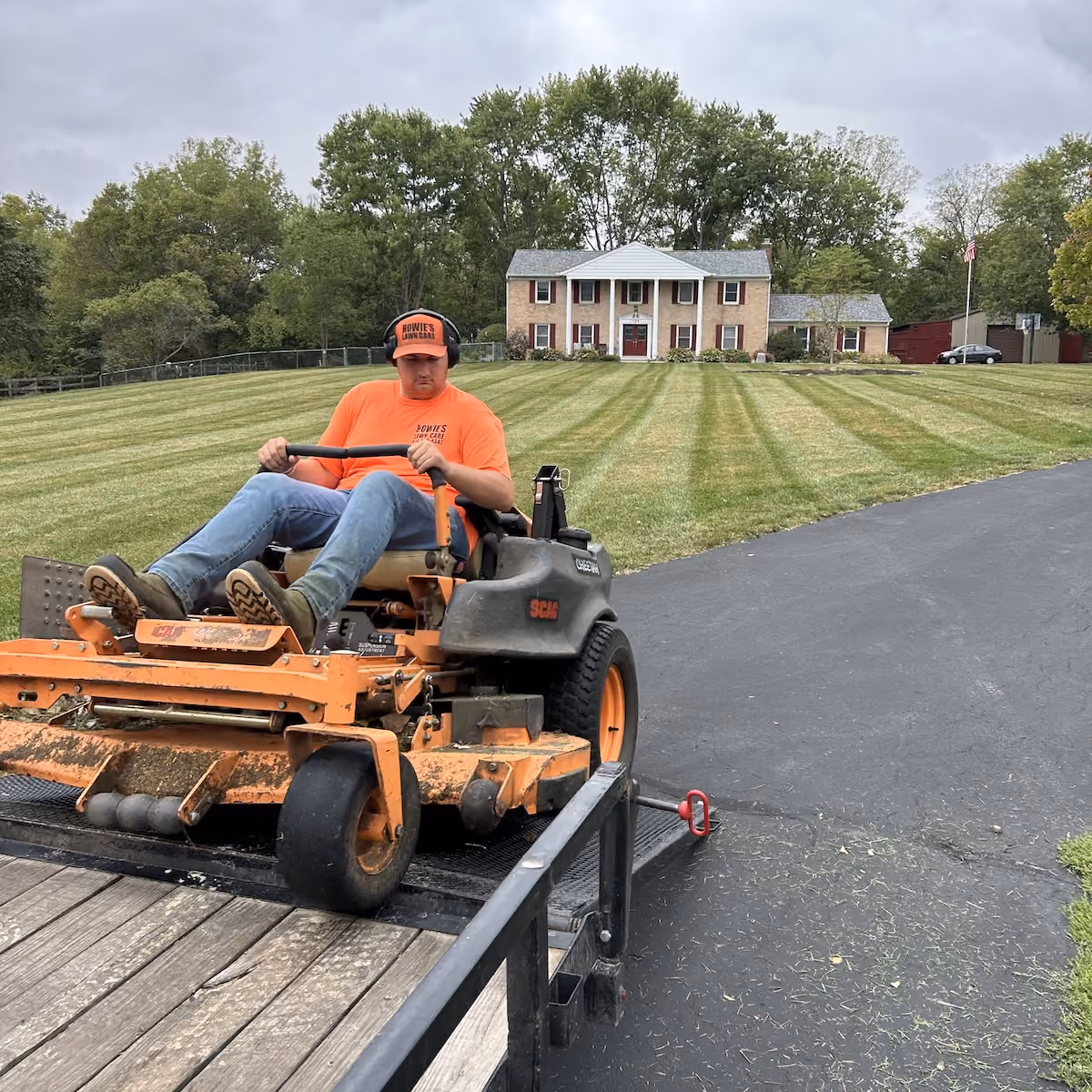 Howie's Lawn Care LLC lawn care truck and equipment