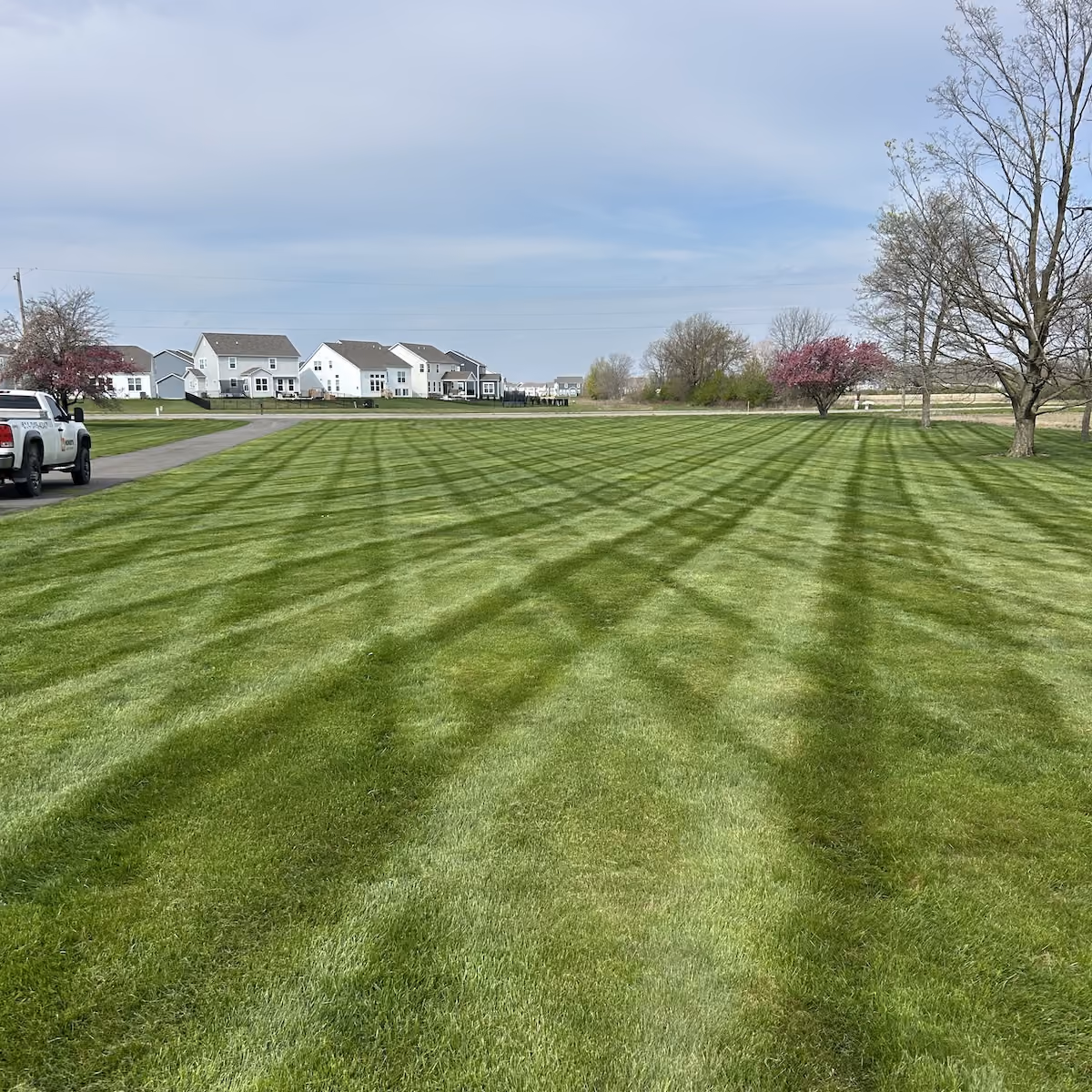 professional mowing edging and trimming by Howie's Lawn Care LLC

