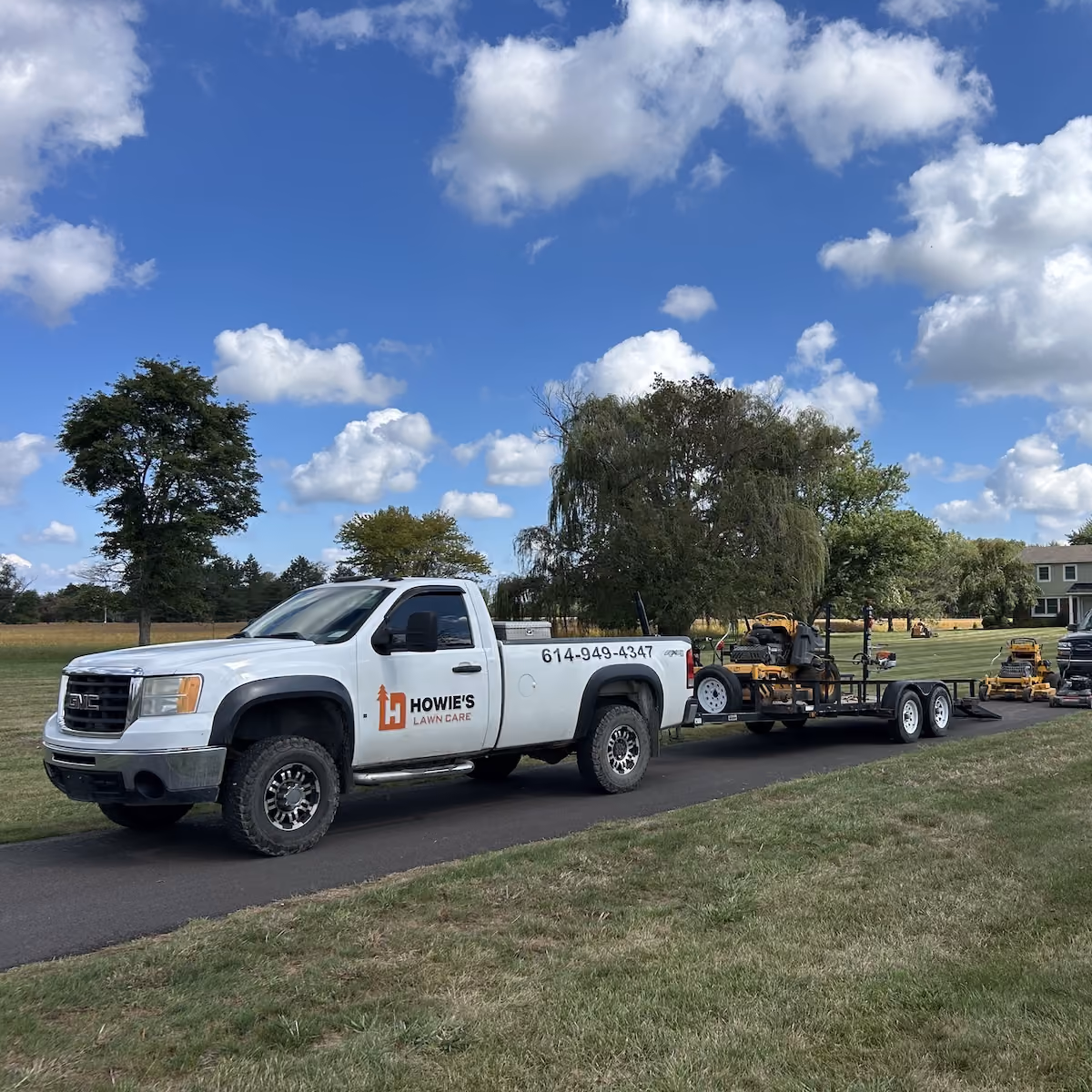 Howie's Lawn Care LLC lawn care truck and equipment