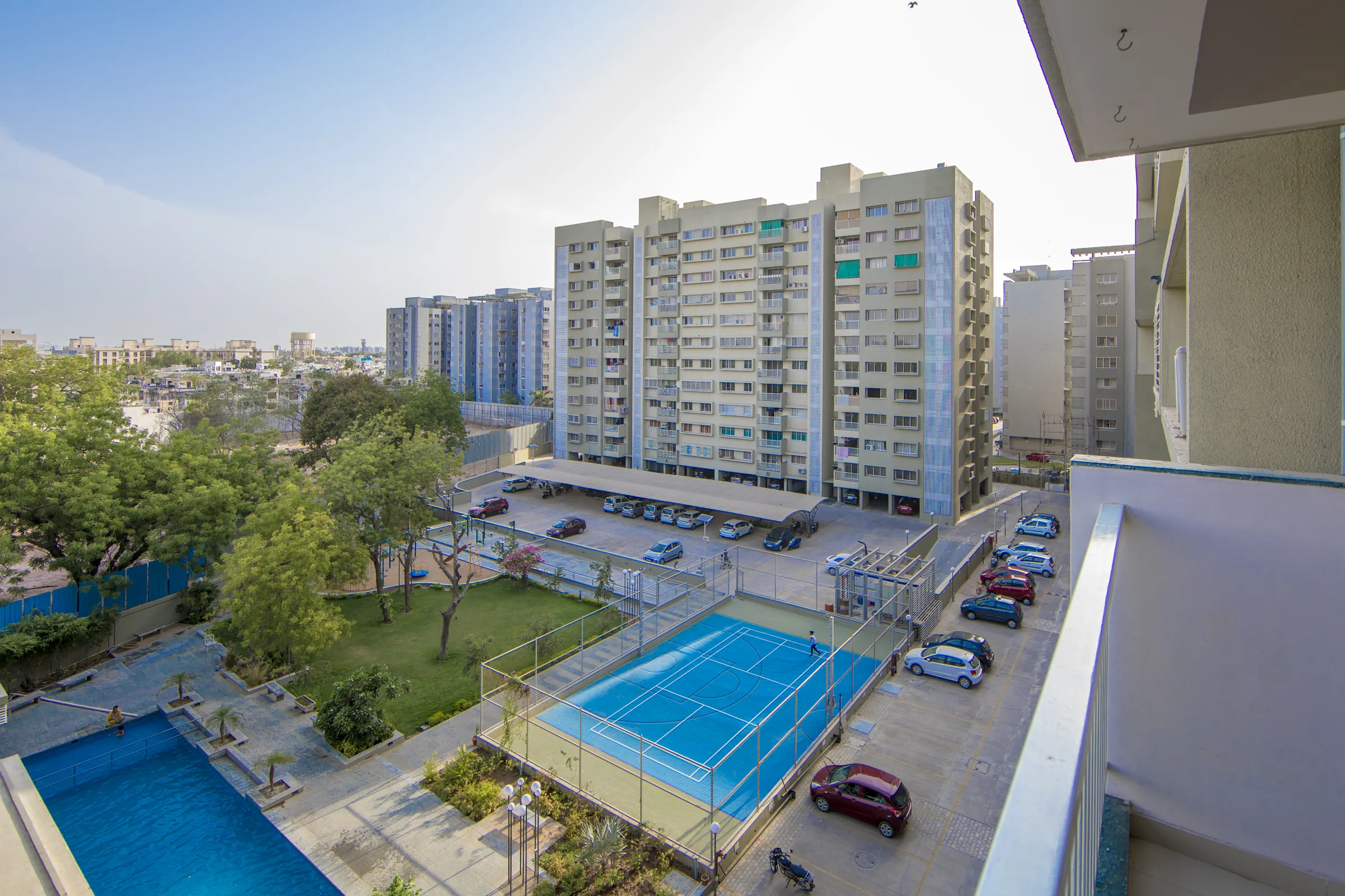 Veda towers, pool and courts seen from above