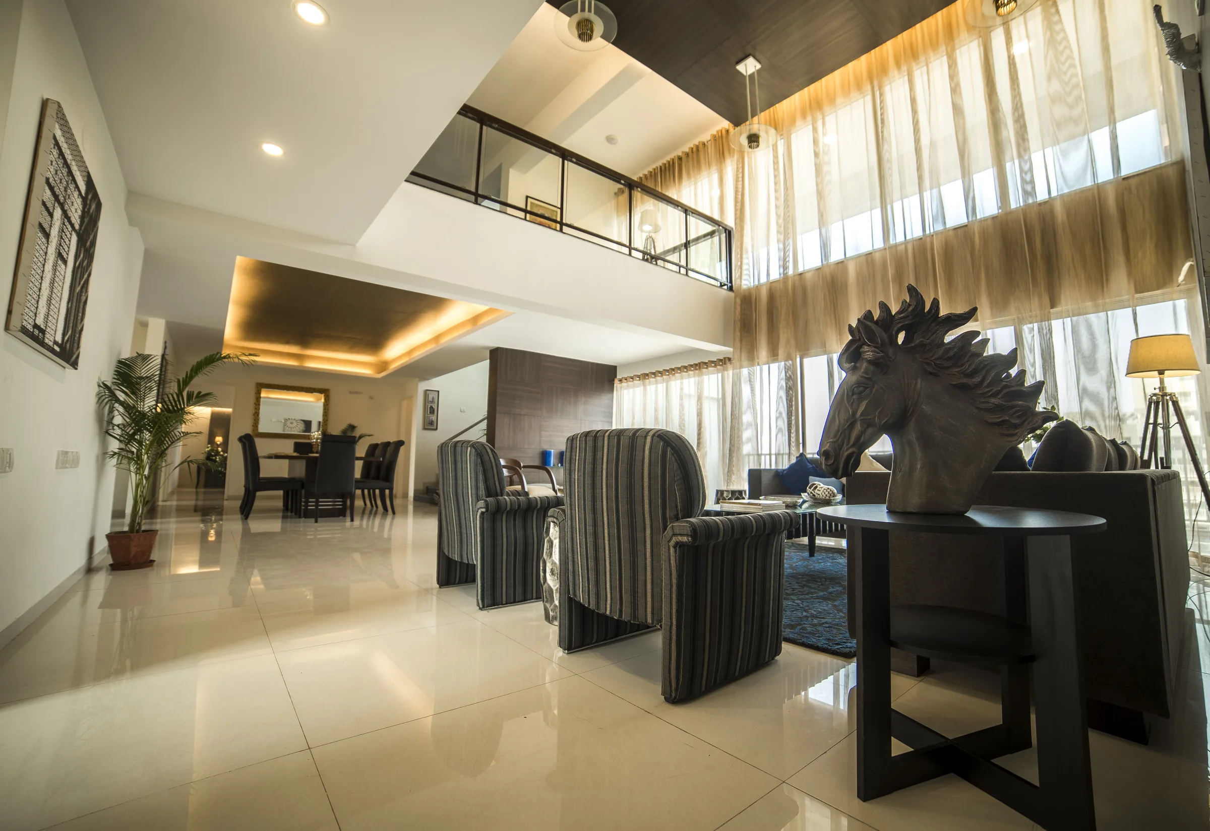 Samsara double-height living and dining area