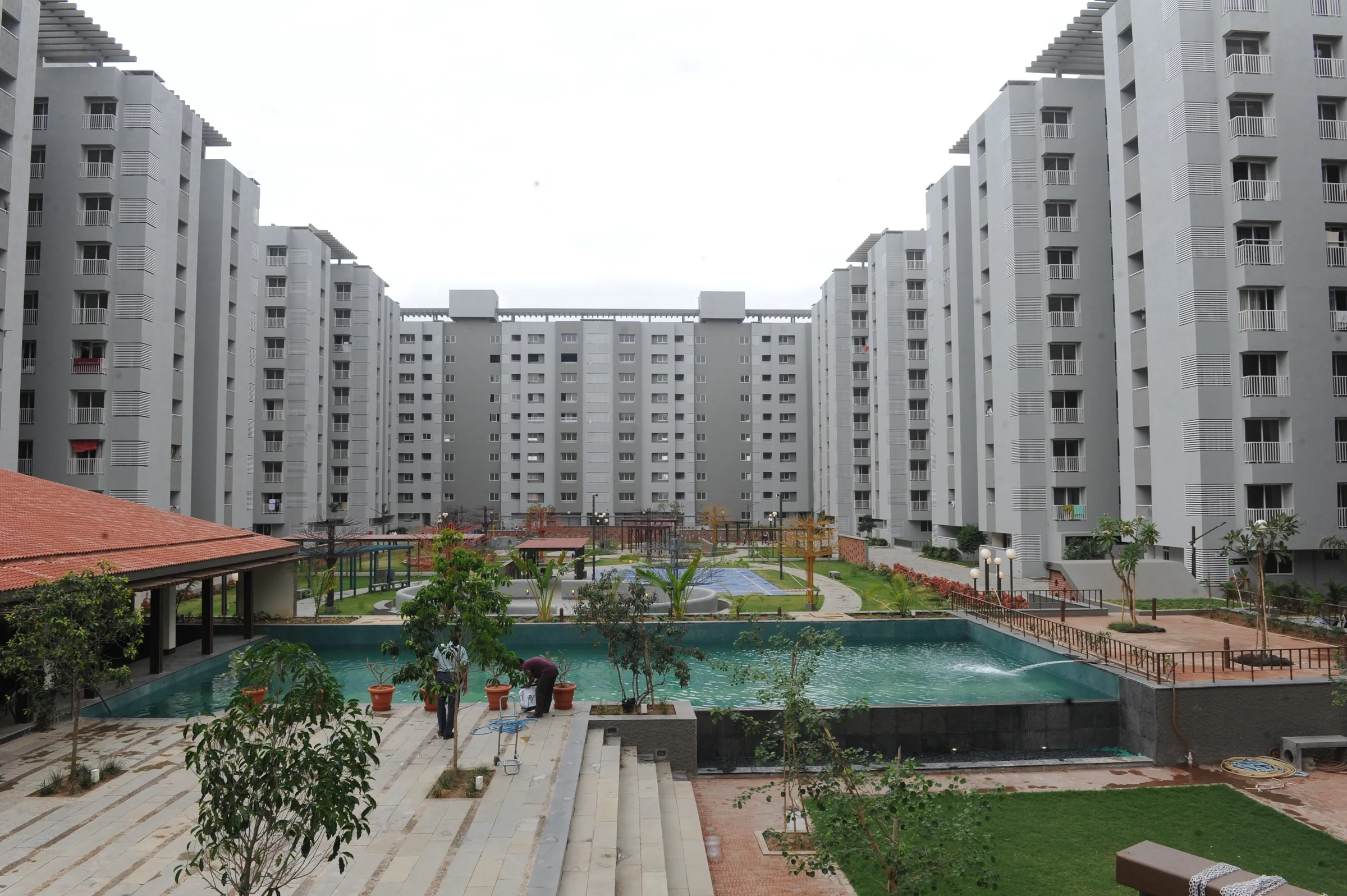 Samsara towers around the landscaped central courtyard and pool
