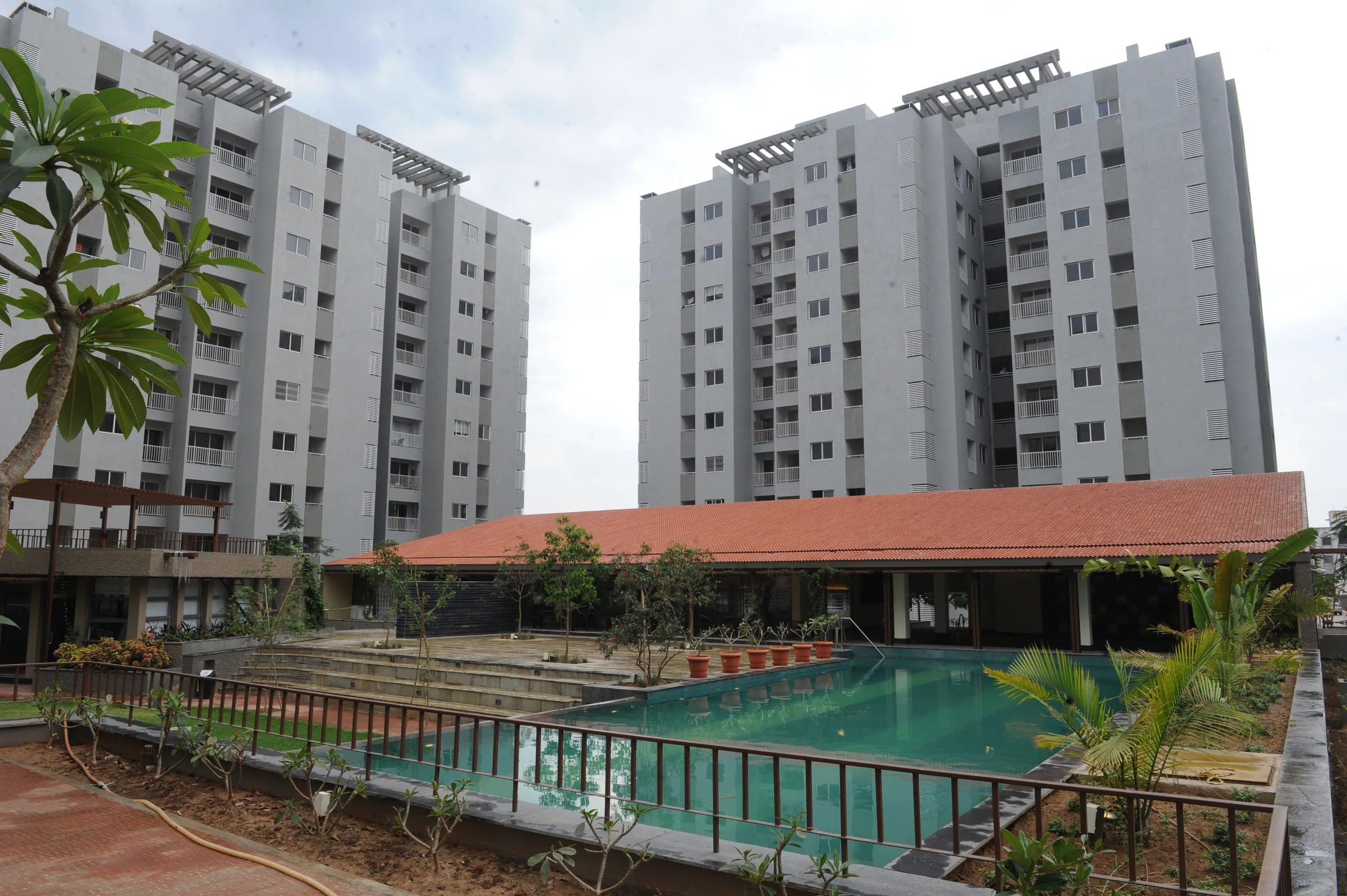 Samsara towers beside the clubhouse and swimming pool