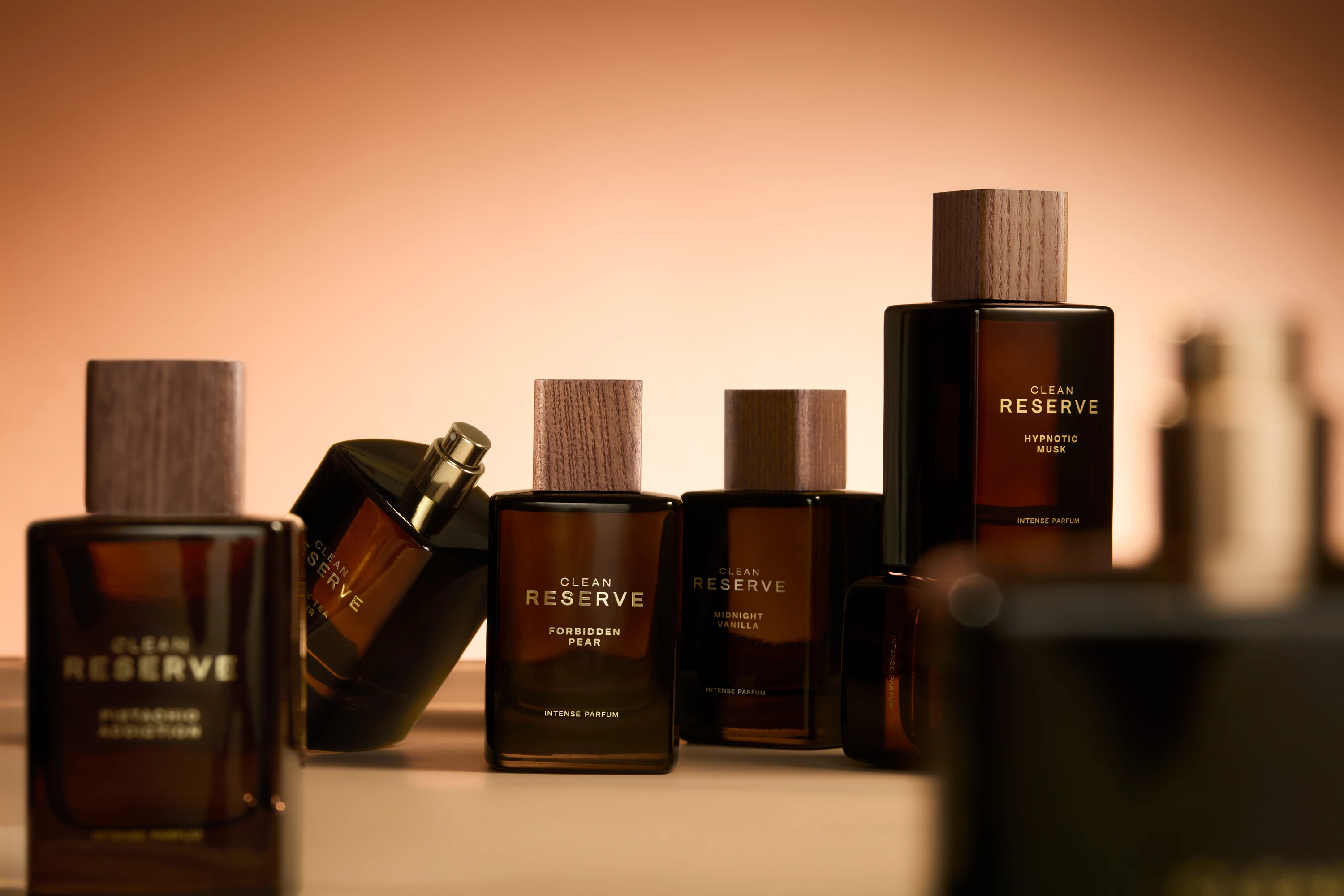 An arrangement of Clean Reserve Indulgence fragrance bottles.