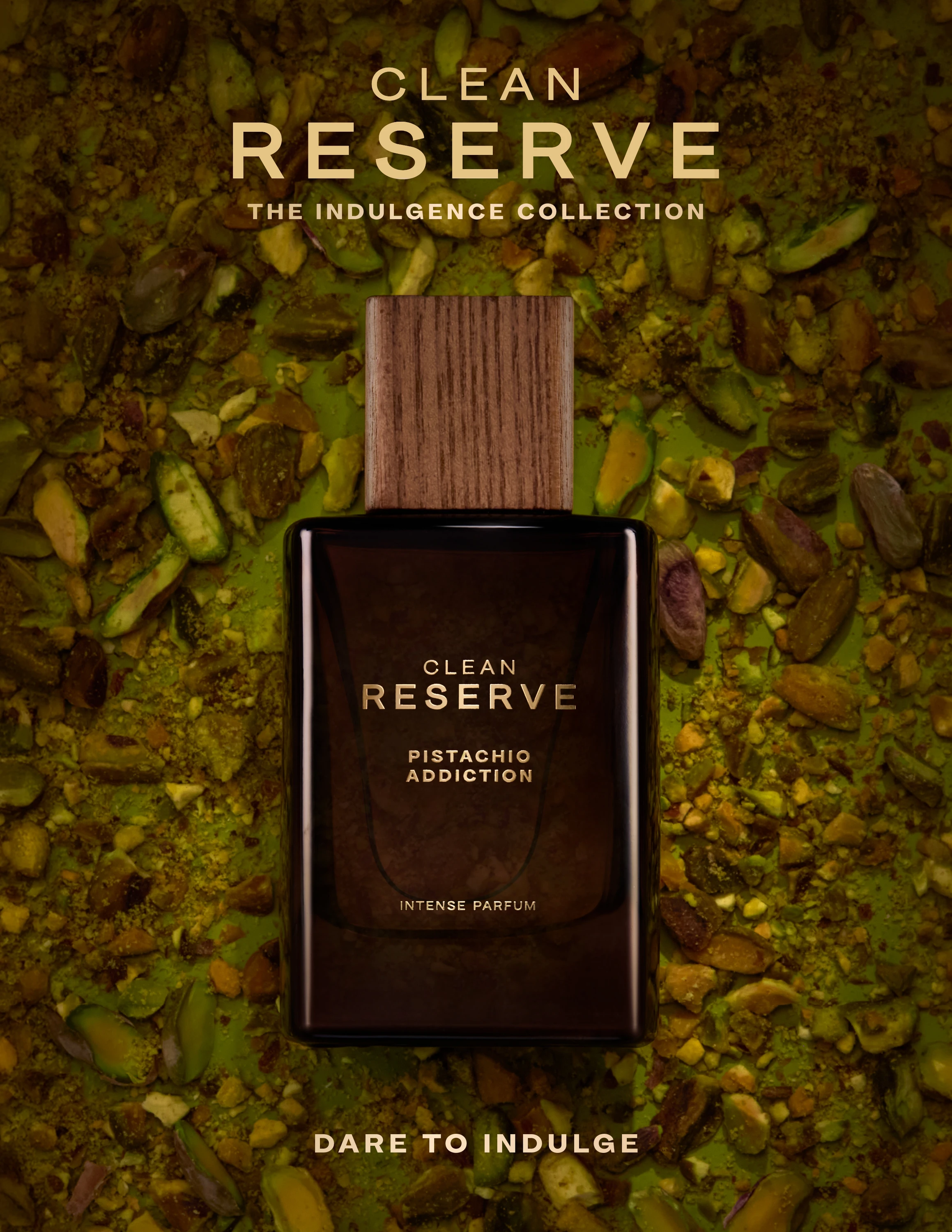A dark Clean Reserve bottle on textured green material.