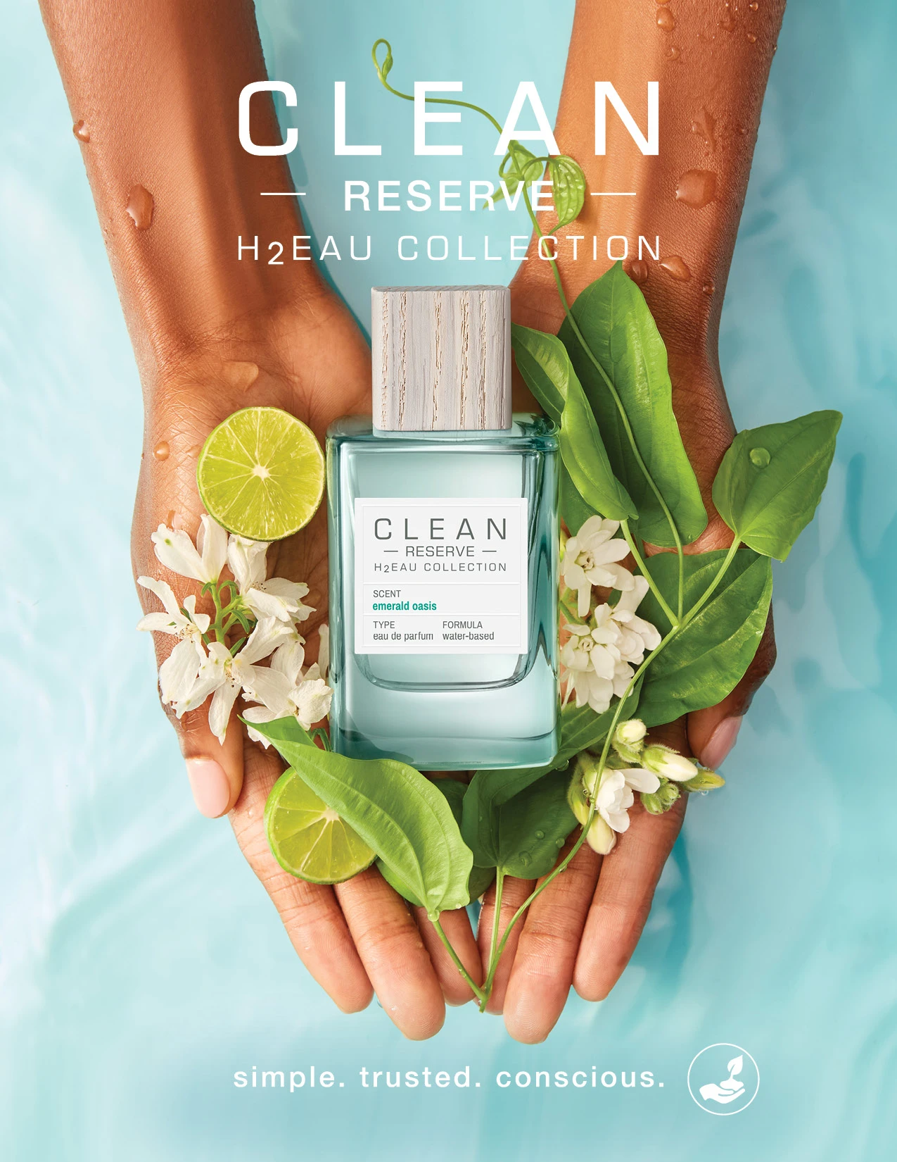 Hands holding a Clean Reserve bottle with green leaves and pale flowers.