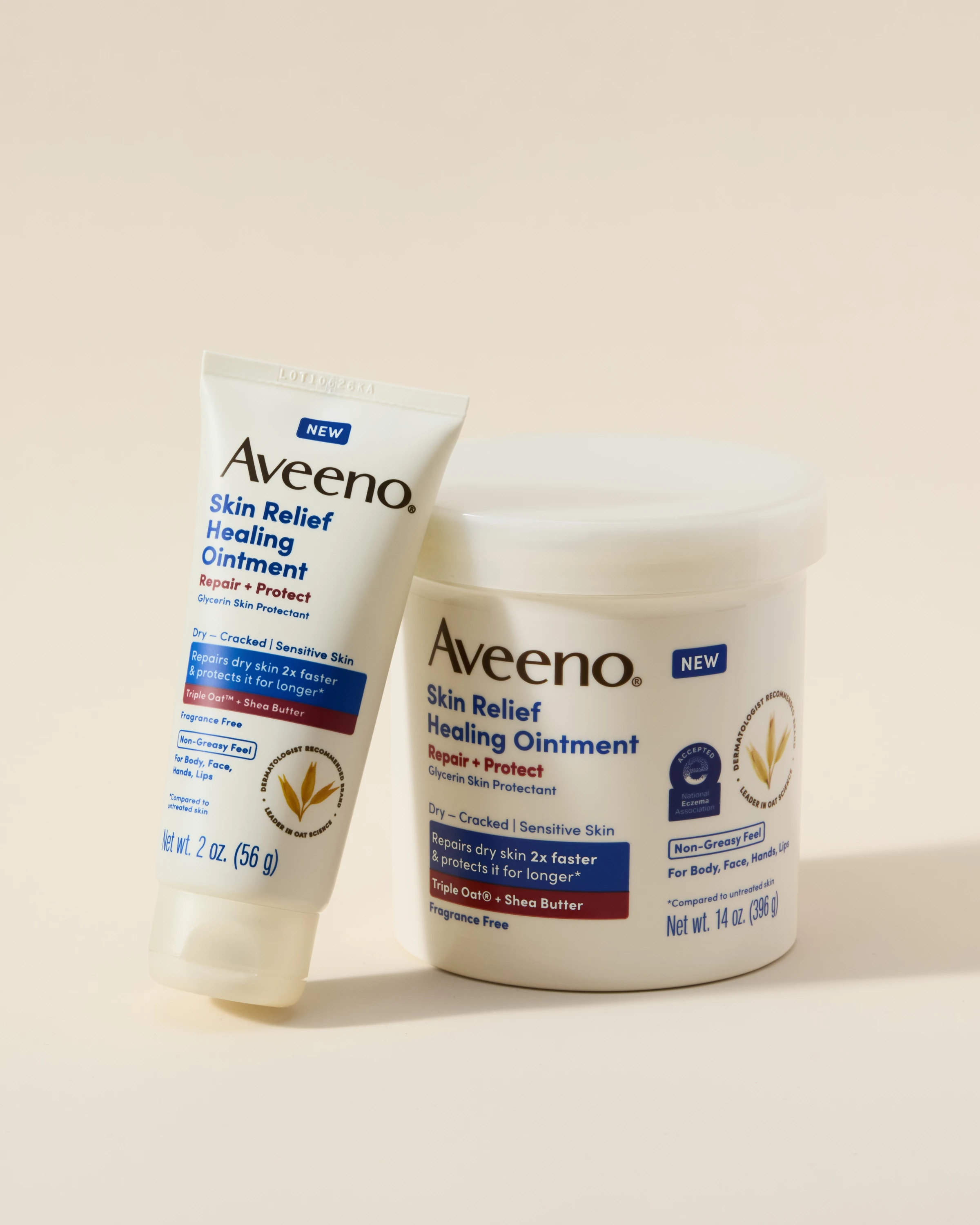 An Aveeno tube and jar against a pale background.