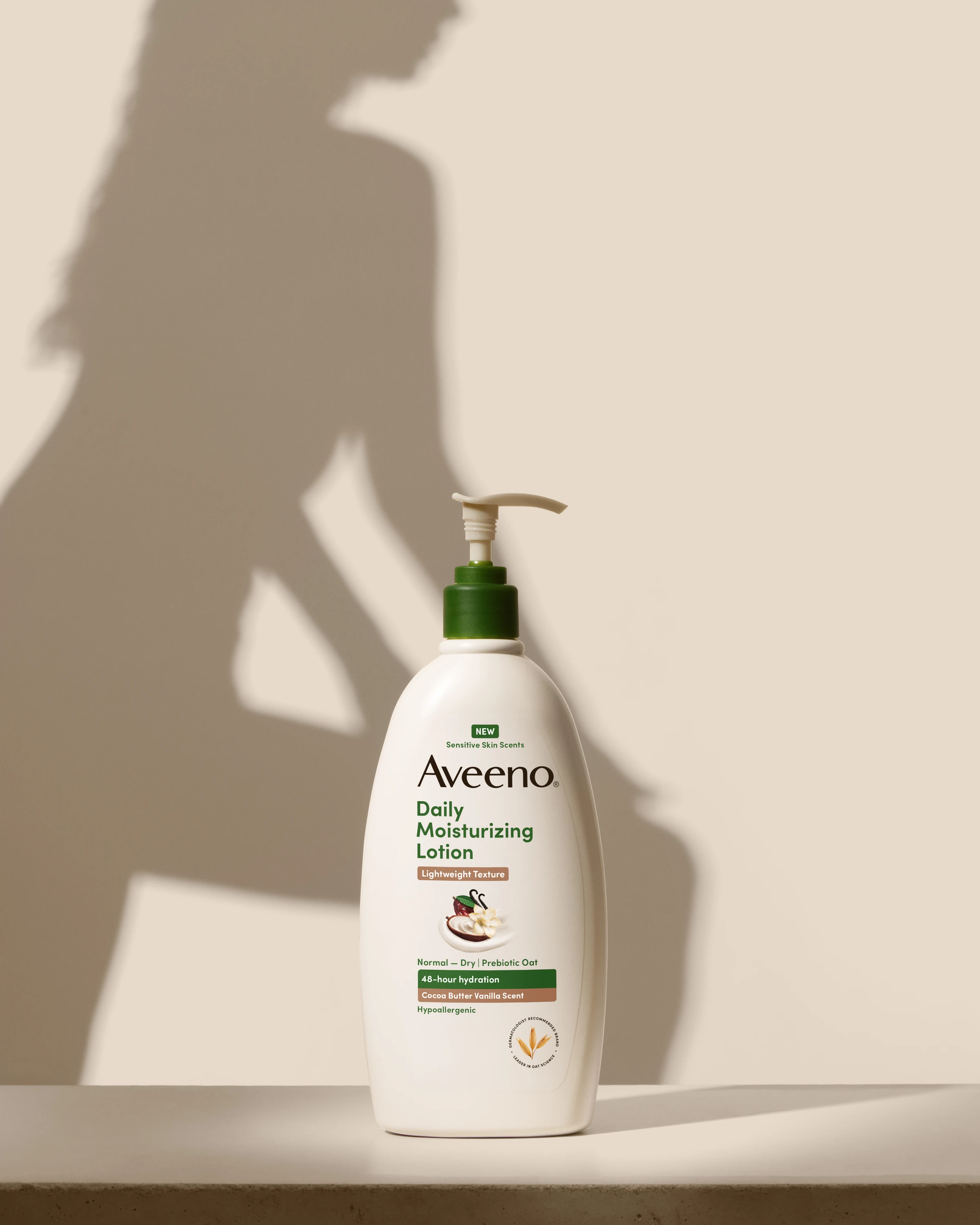 An Aveeno pump bottle beside a human silhouette.