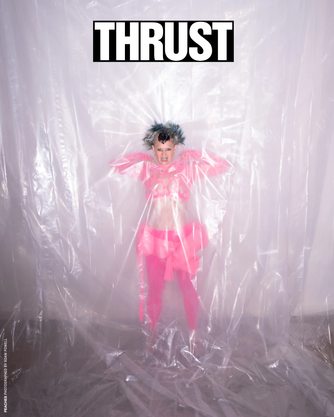 Alternate THRUST cover featuring Peaches behind translucent sheeting.