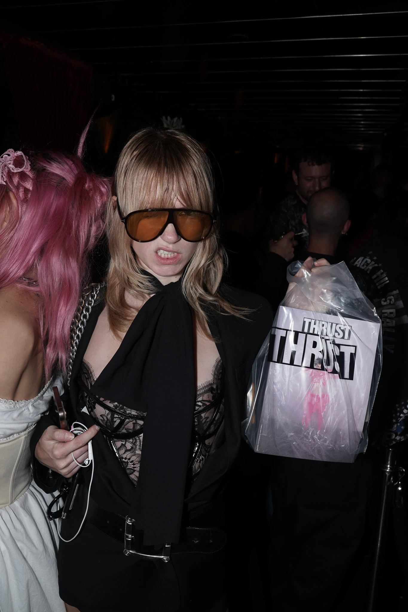 A guest wearing sunglasses at the THRUST launch party.