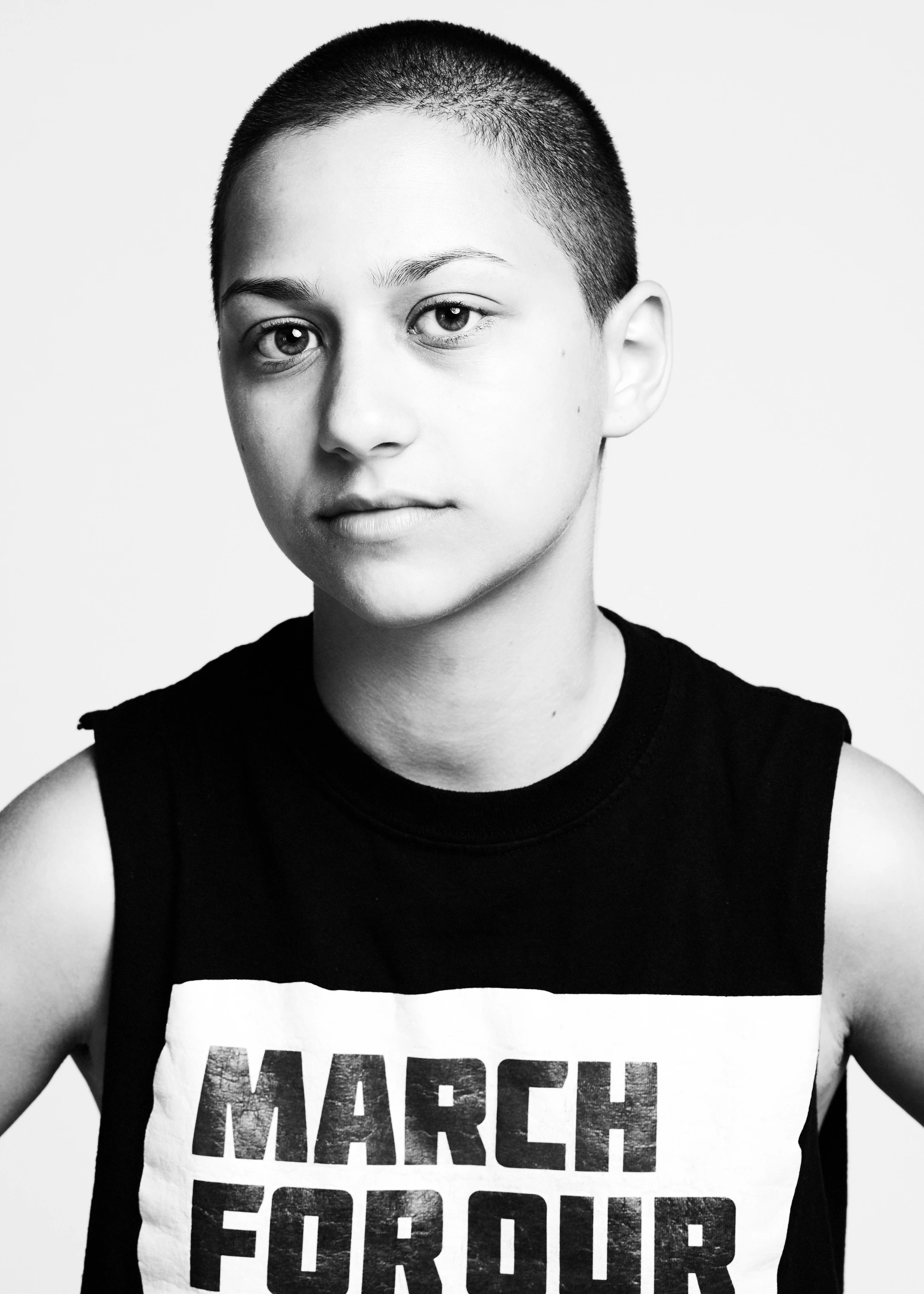 Black-and-white portrait of a participant wearing a March for Our Lives shirt.