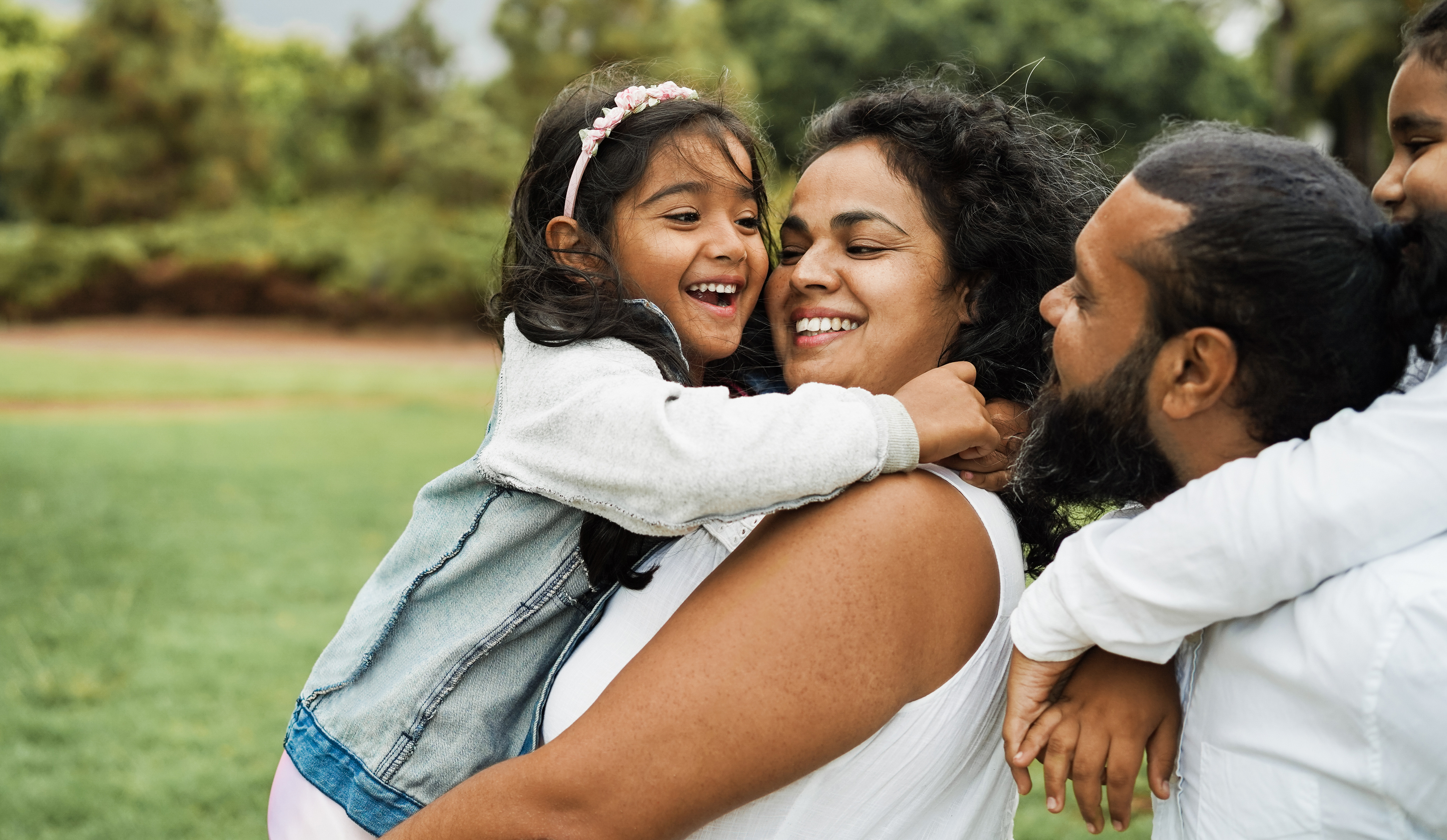 Family hugging stock image