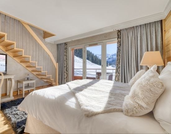 Le duplex et son escalier intérieur : L'Hélios à Méribel.
