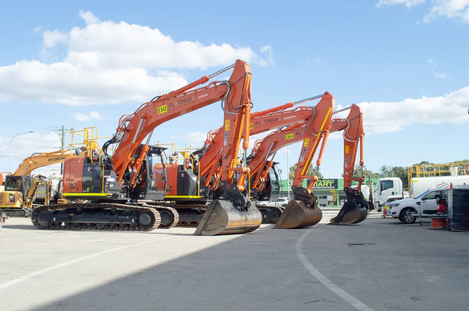 Platinum Hitachi excavator fleet parked at the yard