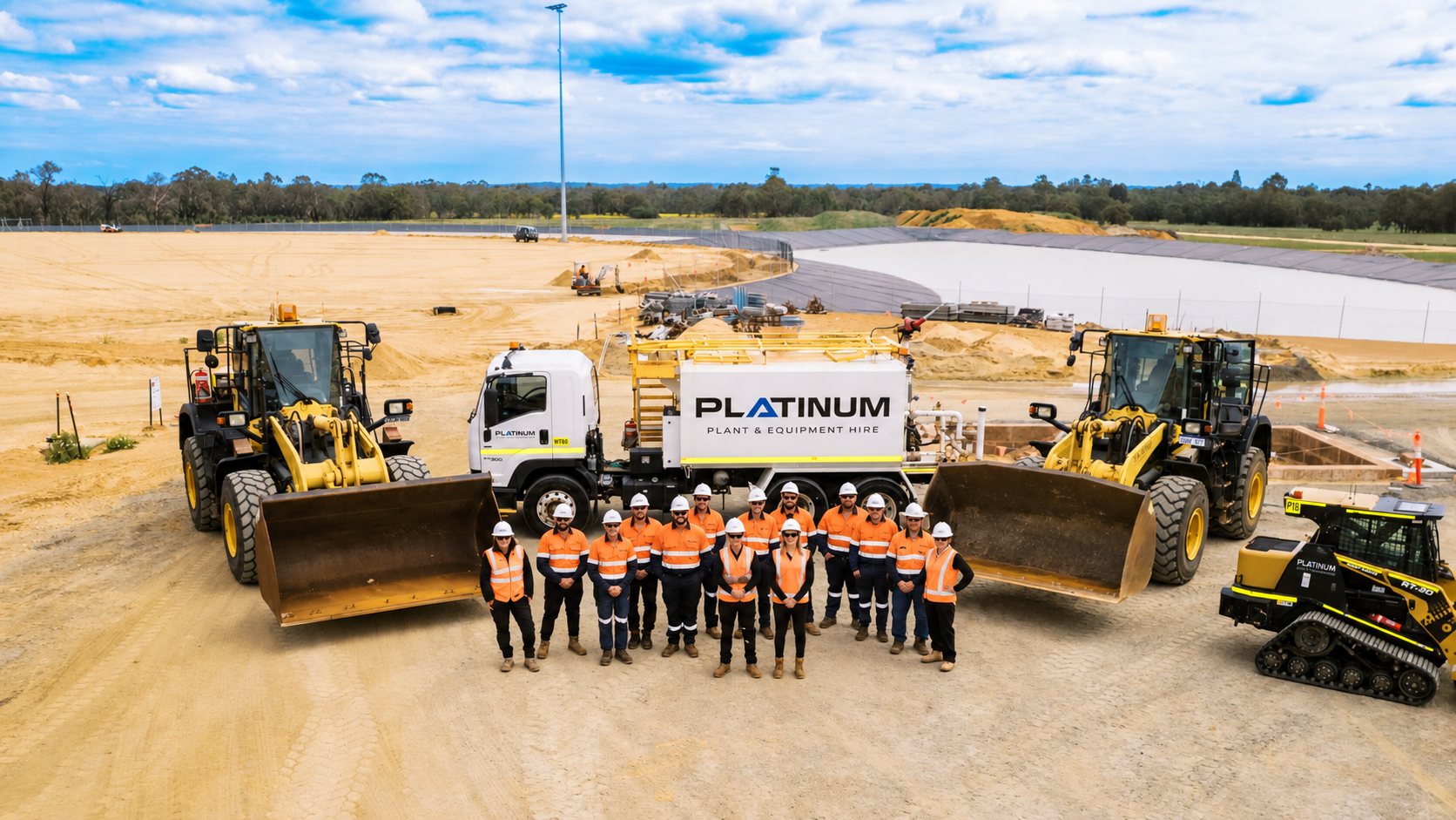 The Platinum crew on site with a water truck, two wheel loaders and a posi-track