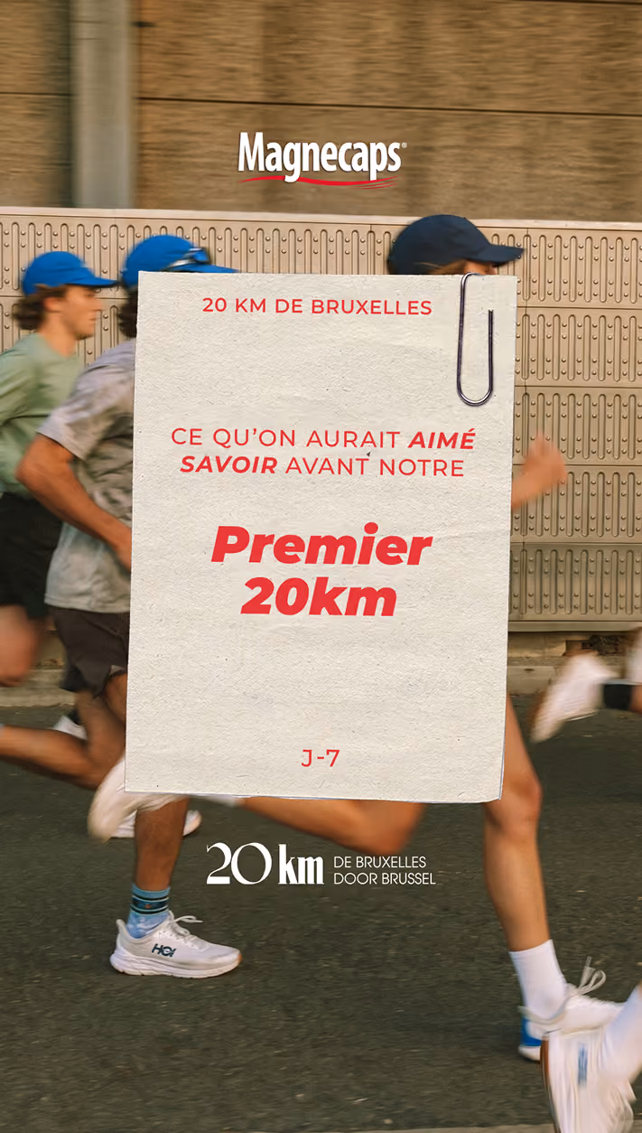 blue2purple - Runners carrying a printed race sign for the 20km de Bruxelles with French text
