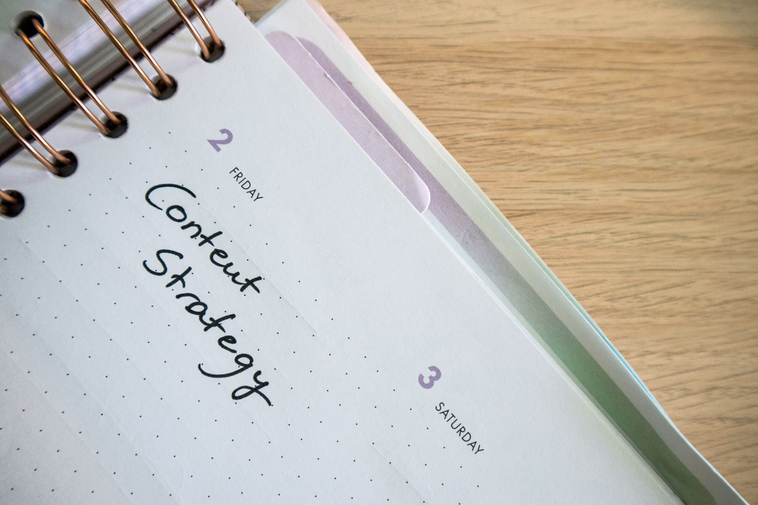 blue2purple - Open planner with Content Strategy written on the page