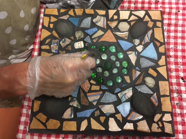 Grouting a mosaic paver