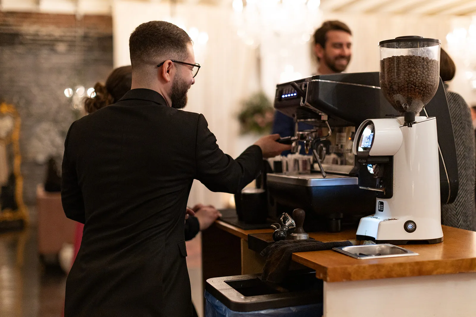 Barista making espresso at the Espresso Nerds coffee bar